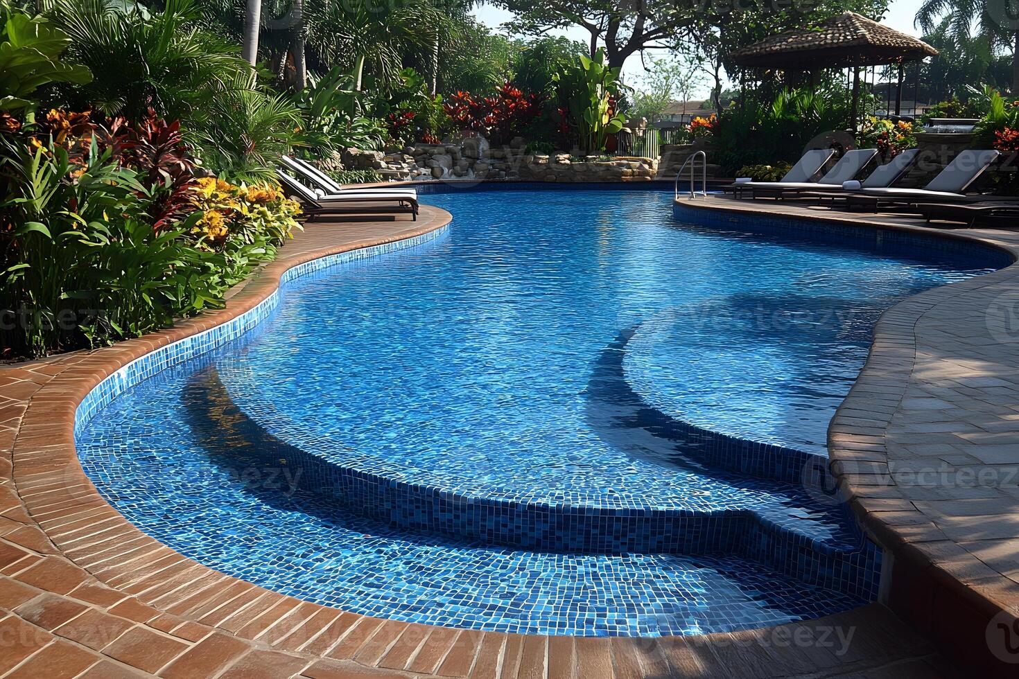 Tropical Resort Pool with Sun Loungers and Lush Greenery for Relaxation and Luxury Travel photo