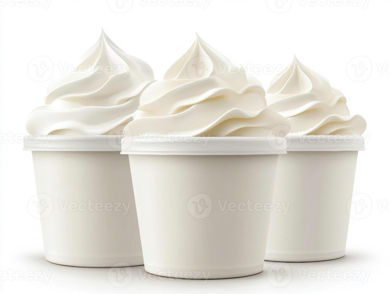 Whipped cream swirls in white cups on a plain background photo