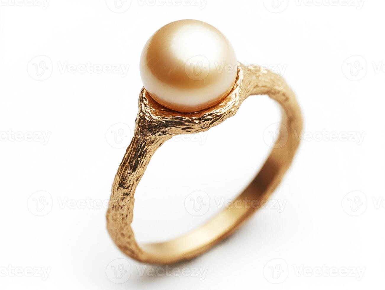 Elegant pearl ring on a textured golden band for special occasions photo