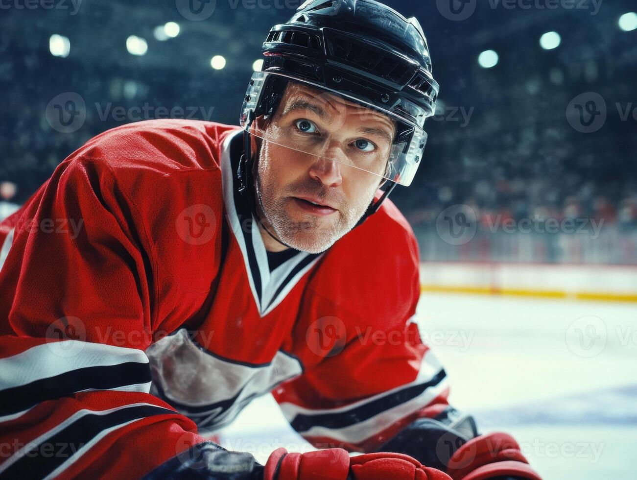 Hockey player ready for action on the ice during a game photo