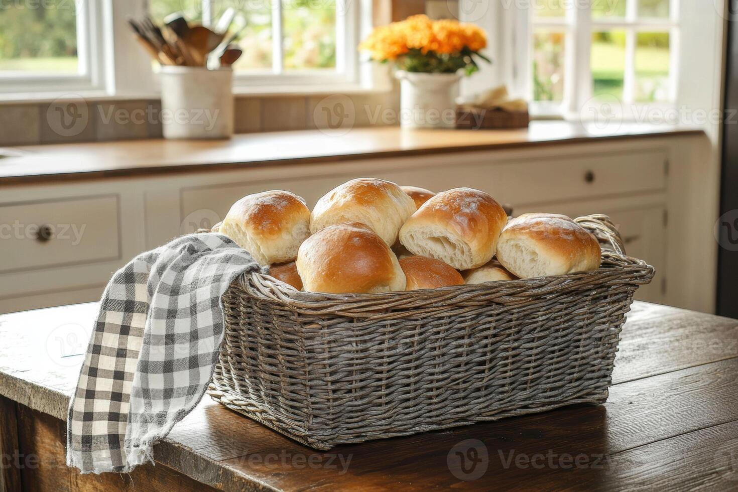 Freshly baked rolls in a rustic kitchen setting in daylight photo