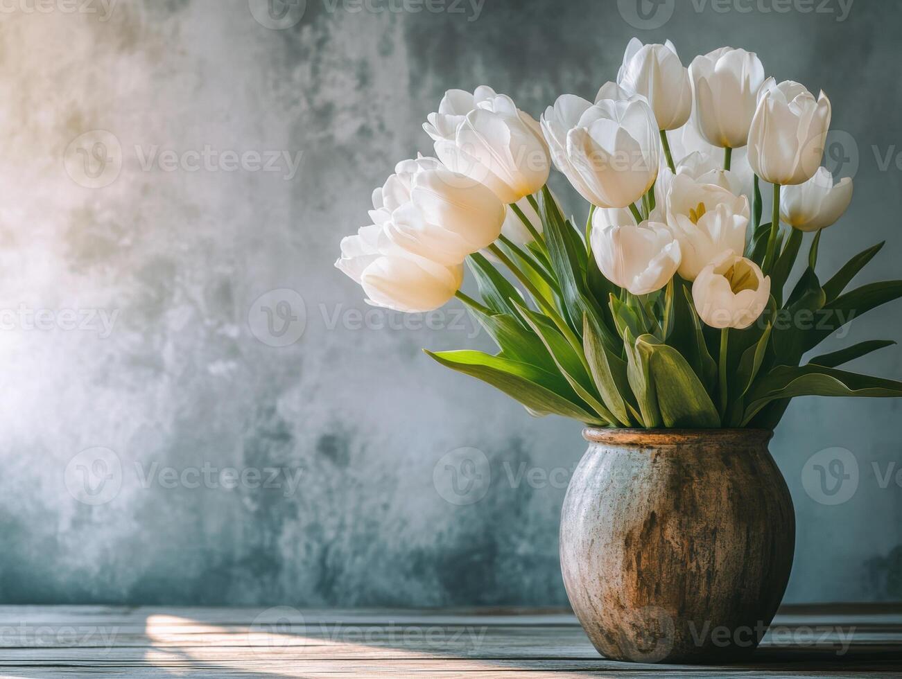 Elegant white tulips in a rustic vase on a wooden table photo