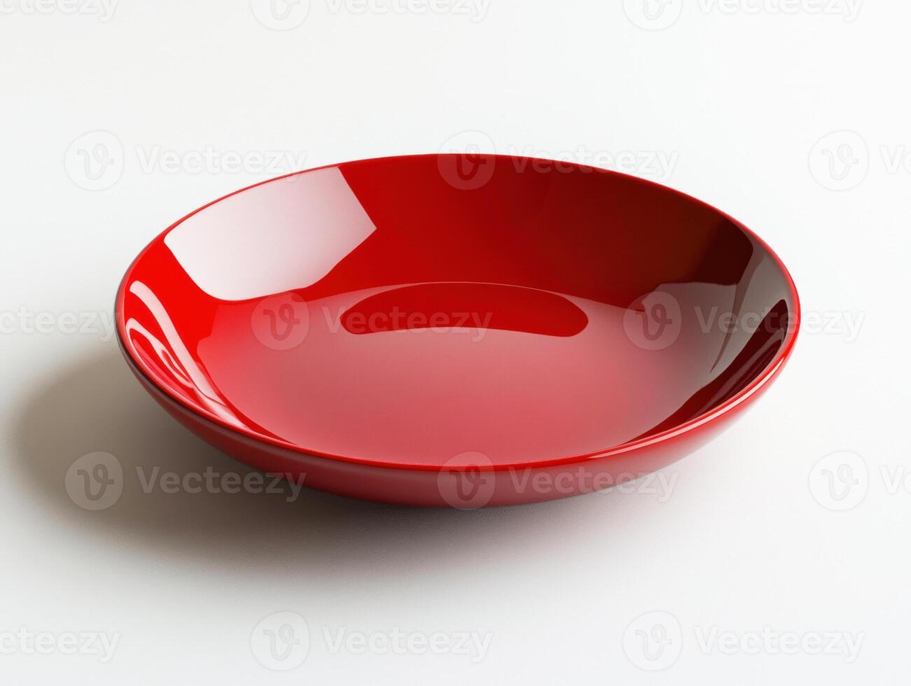 Bright red ceramic bowl on a clean surface in a minimal setting photo