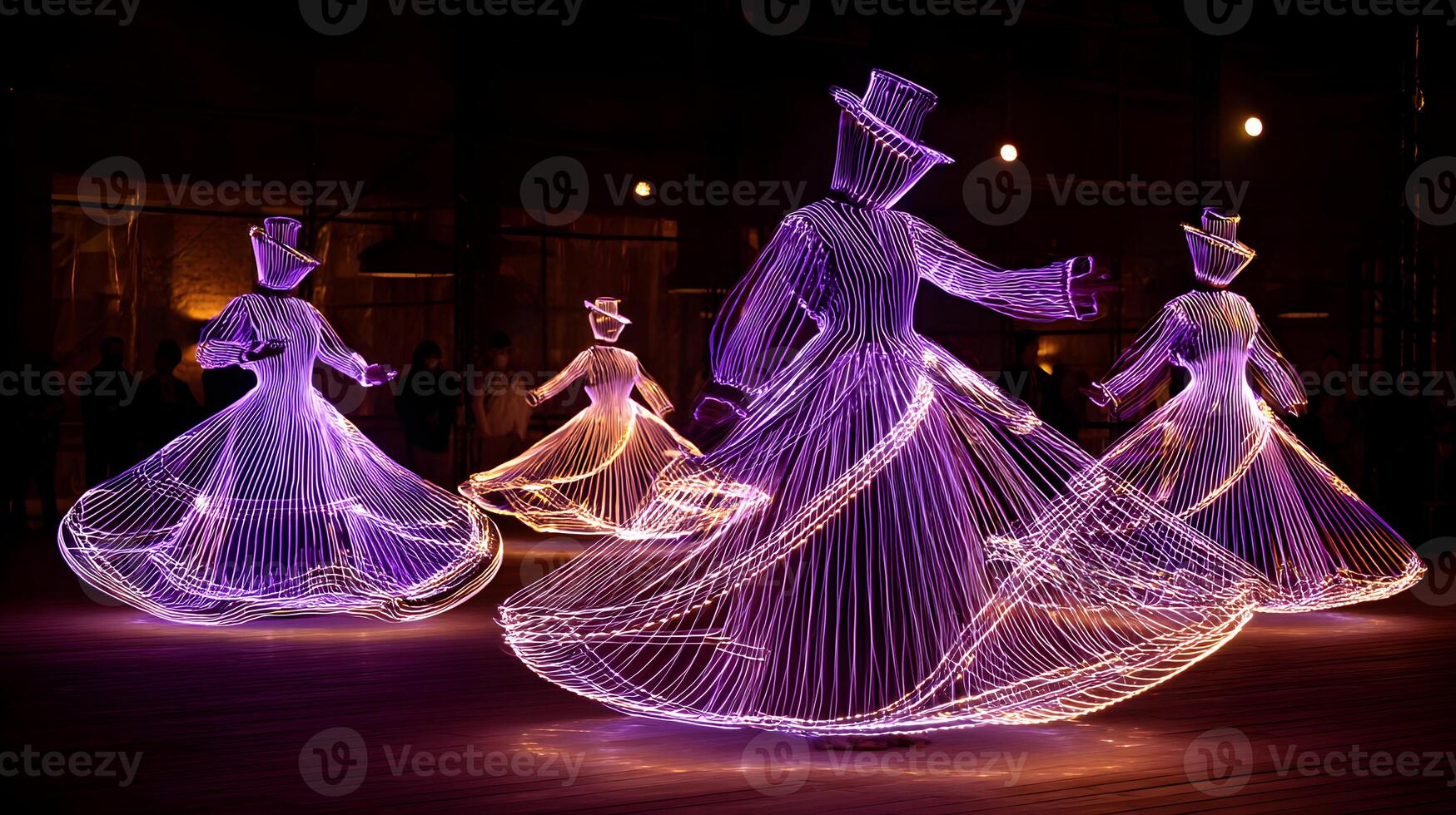 Illuminated figures gracefully dance in the night creating a mesmerizing display of art and light photo