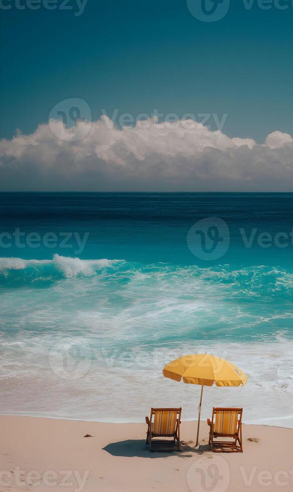 Relaxing beach scene with chairs and umbrella under a clear blue sky and gentle waves photo