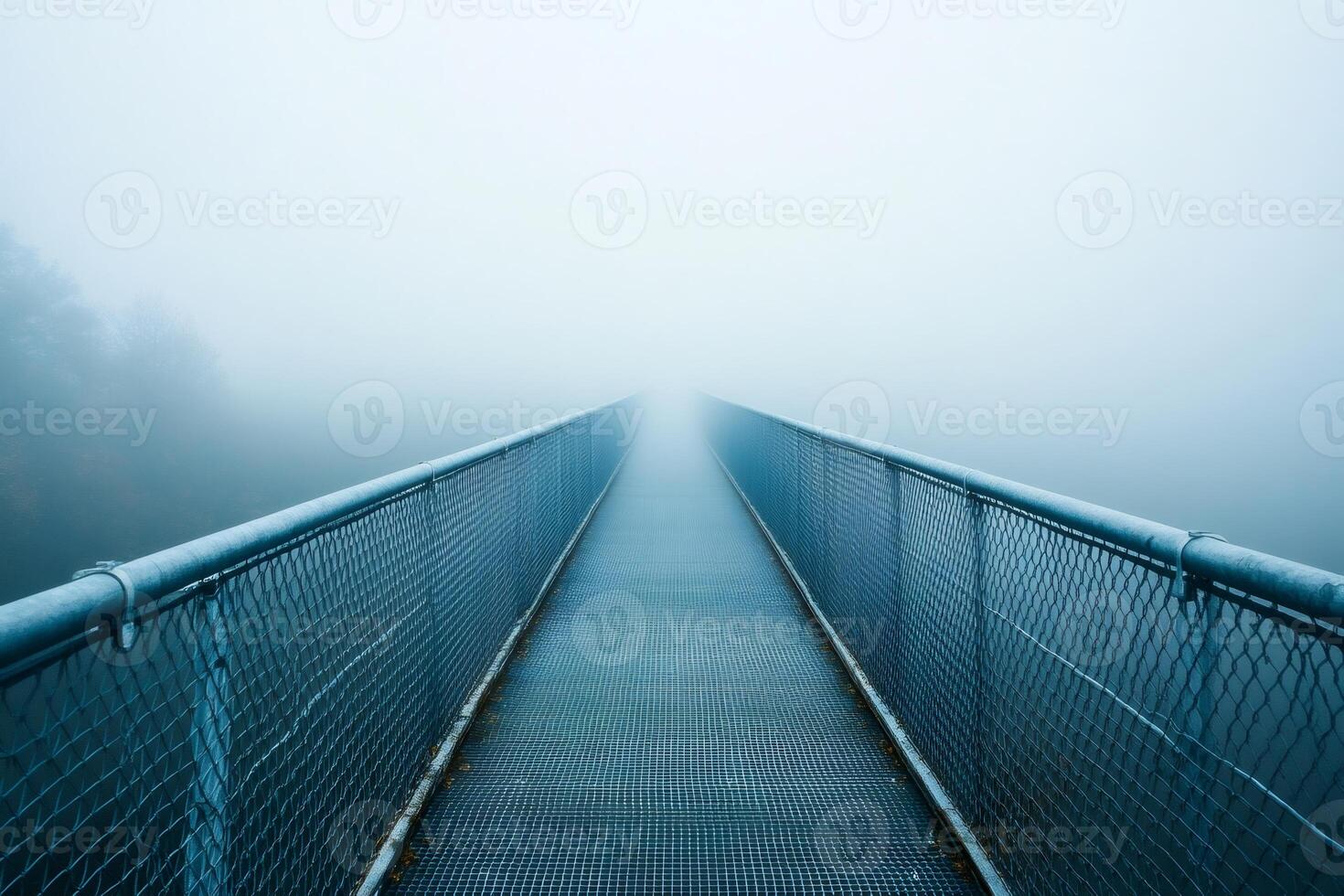 Metal grating bridge disappearing into the fog leading to uncertainty photo