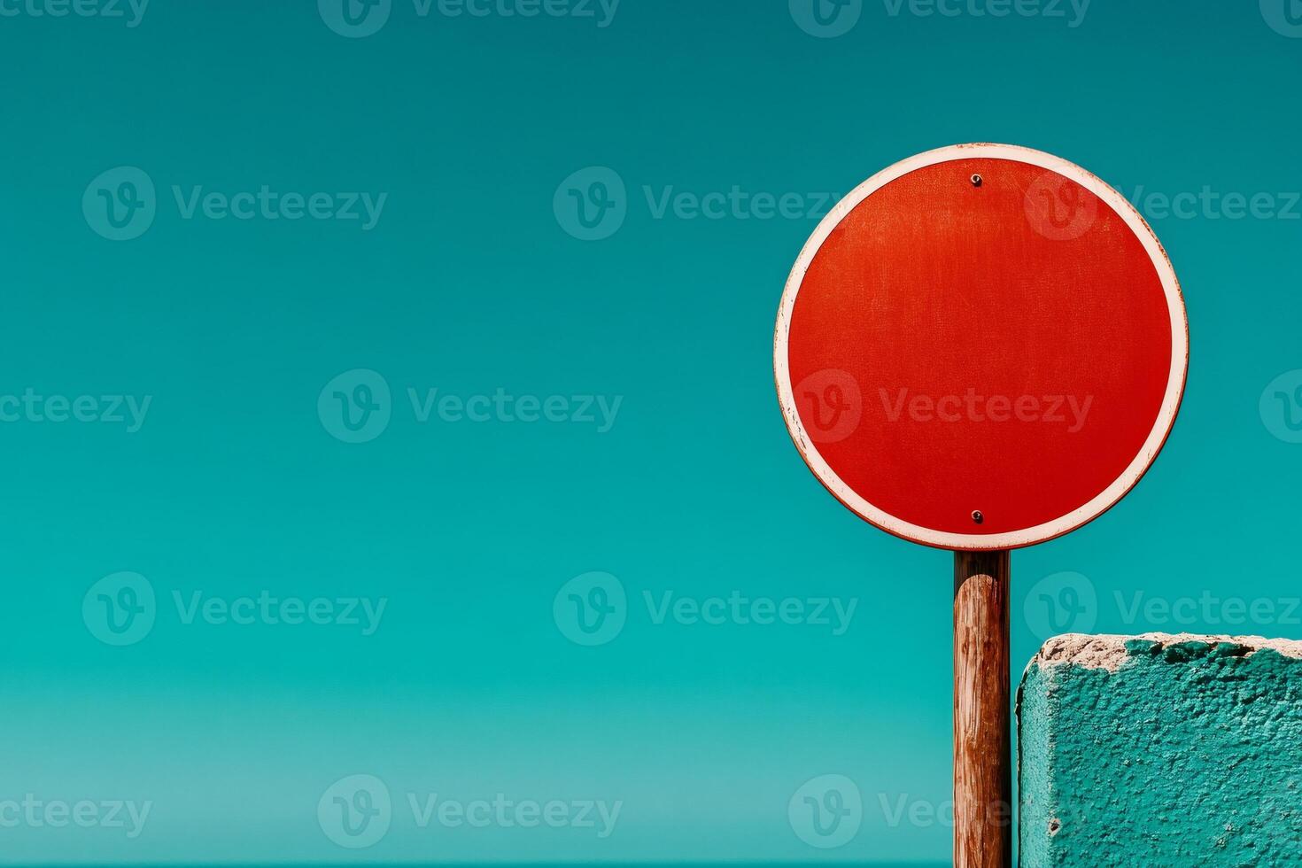 Blank red sign against turquoise sky and sea background stands for prohibition concept photo