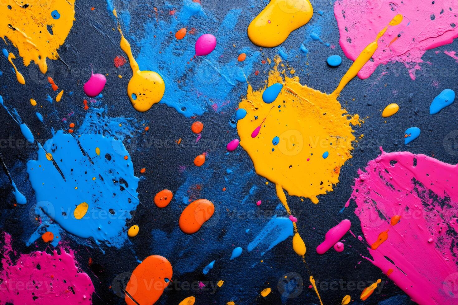 Colorful paint splattering on dark background creating abstract design photo