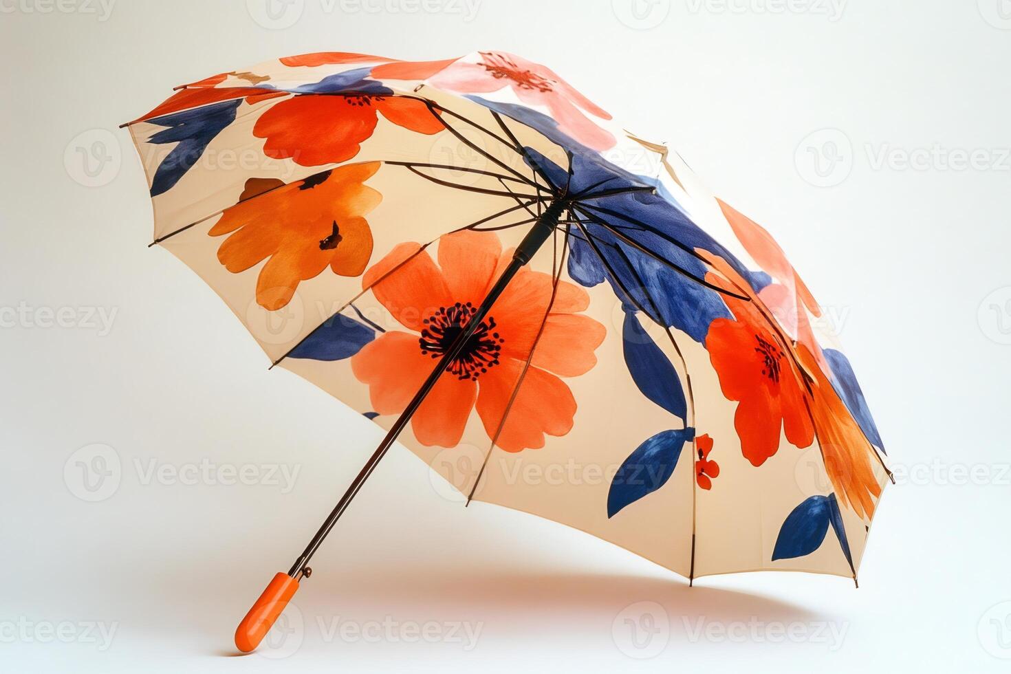 Stylish umbrella with floral print standing on white background photo