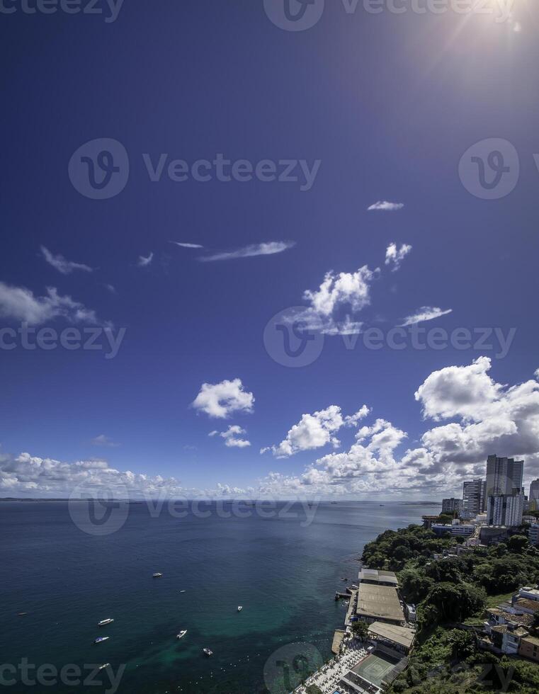 Aerial view of Salvador Bahia Brazil featuring the Bay of All Saints under a blue sky photo