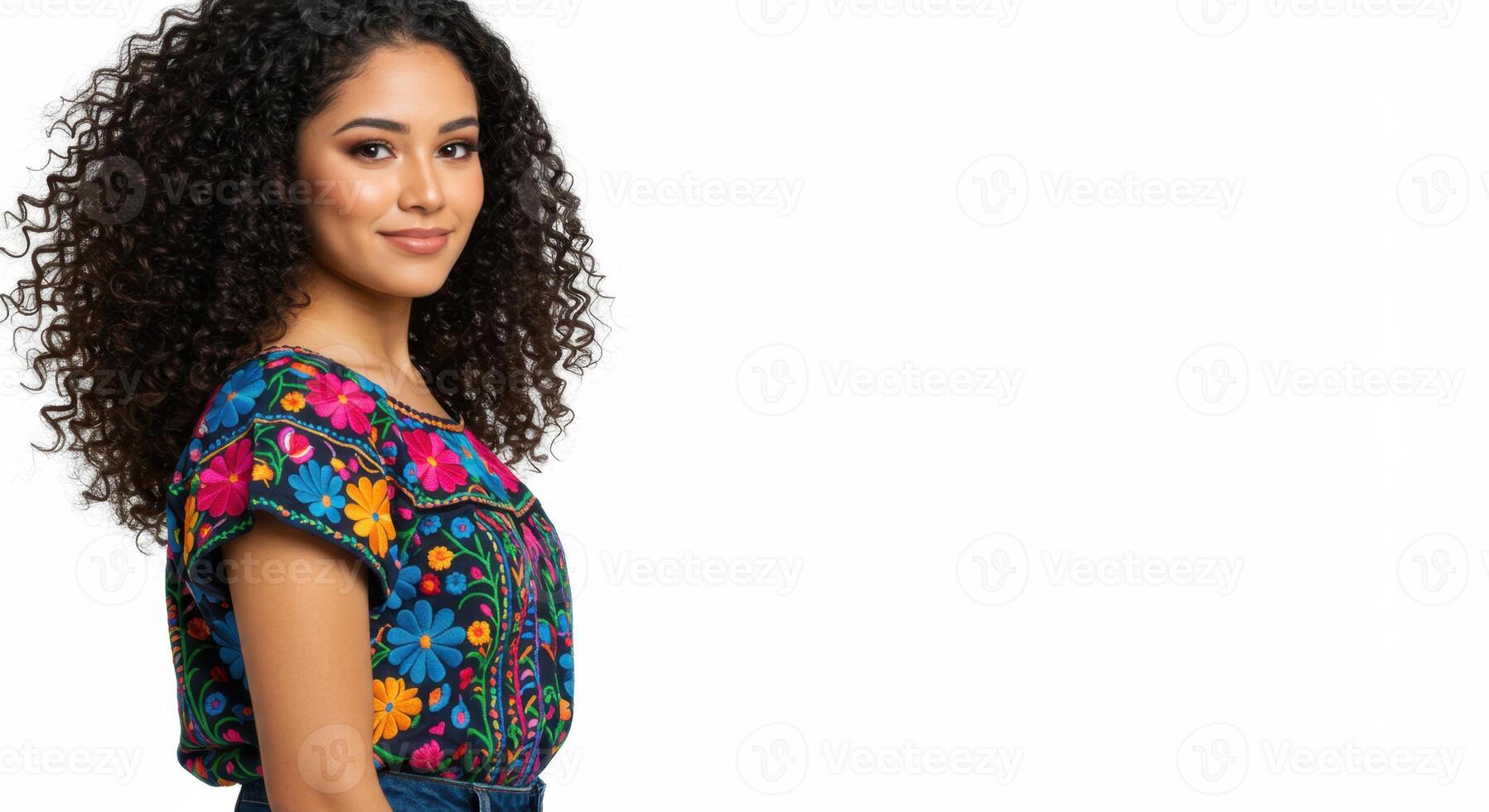 Confident Latina Woman in Colorful Embroidered Top Smiling with Natural Curly Hair, Cultural Fashion and Identity Concept photo