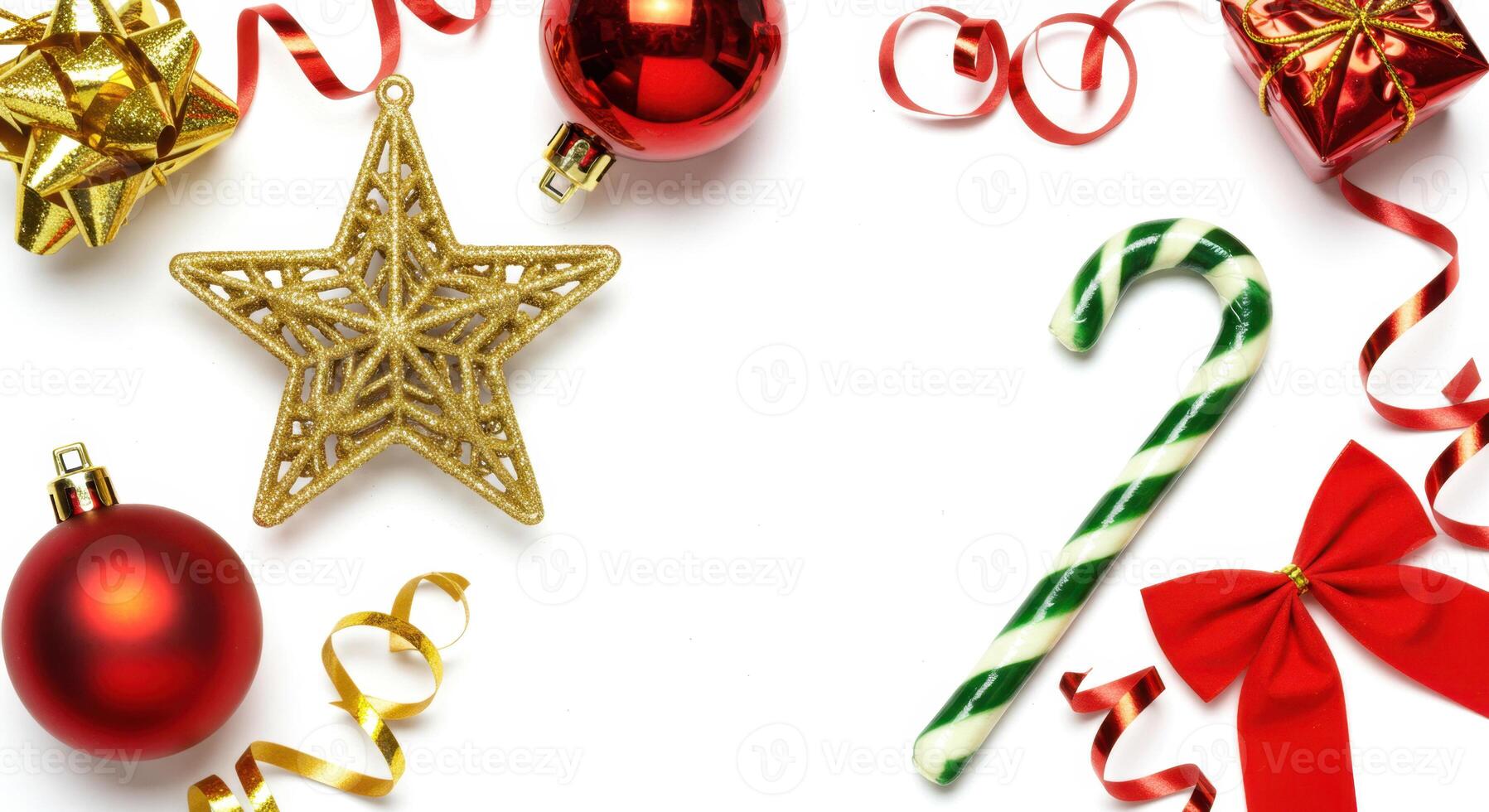 Flat Lay of Christmas Decorations with Candy Cane and Ornaments on White Background photo