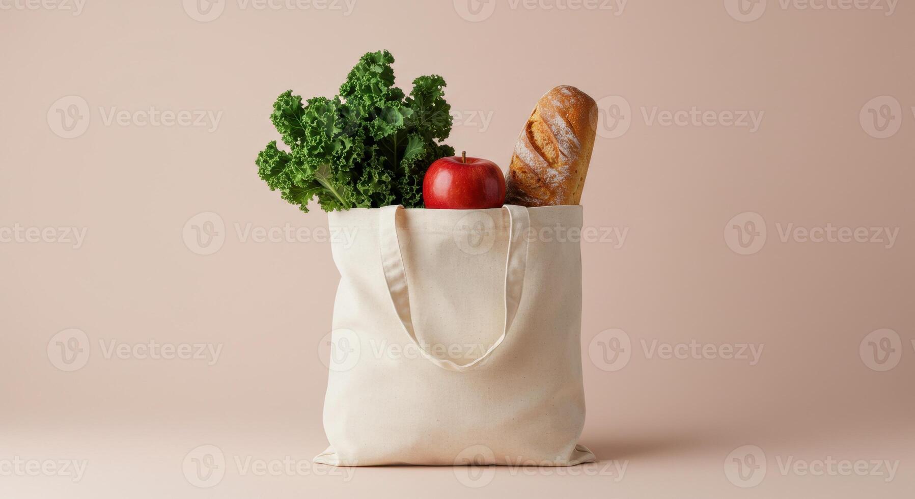 Minimalist Grocery Bag with Fresh Kale Apple and Bread on Neutral Background photo