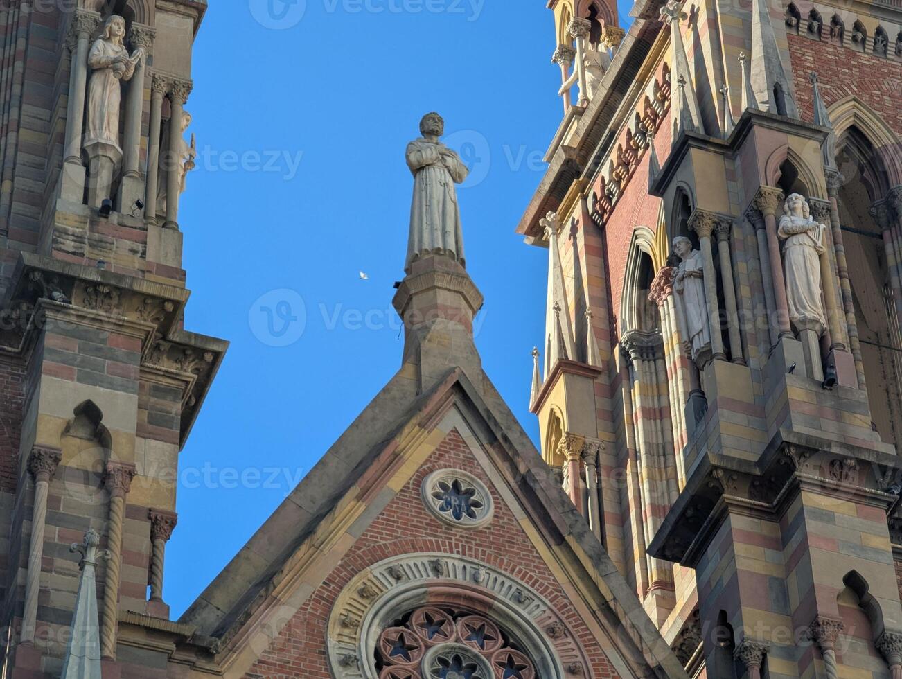 View of Church of the Sacred Heart of Jesus Capuchin Church in Cordoba, Argentina. Upper part. Sculptures photo