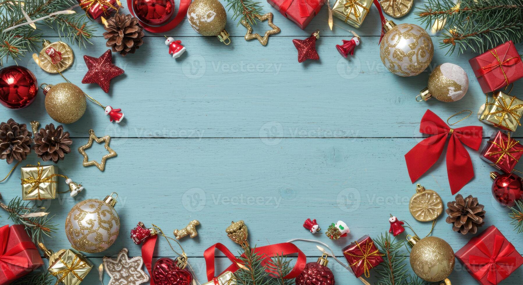 Christmas Holiday Border with Ornaments and Gifts on Blue Wooden Background photo