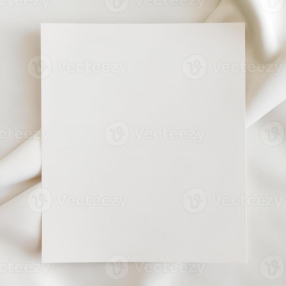 Empty white square mockup on flowing white textile photo