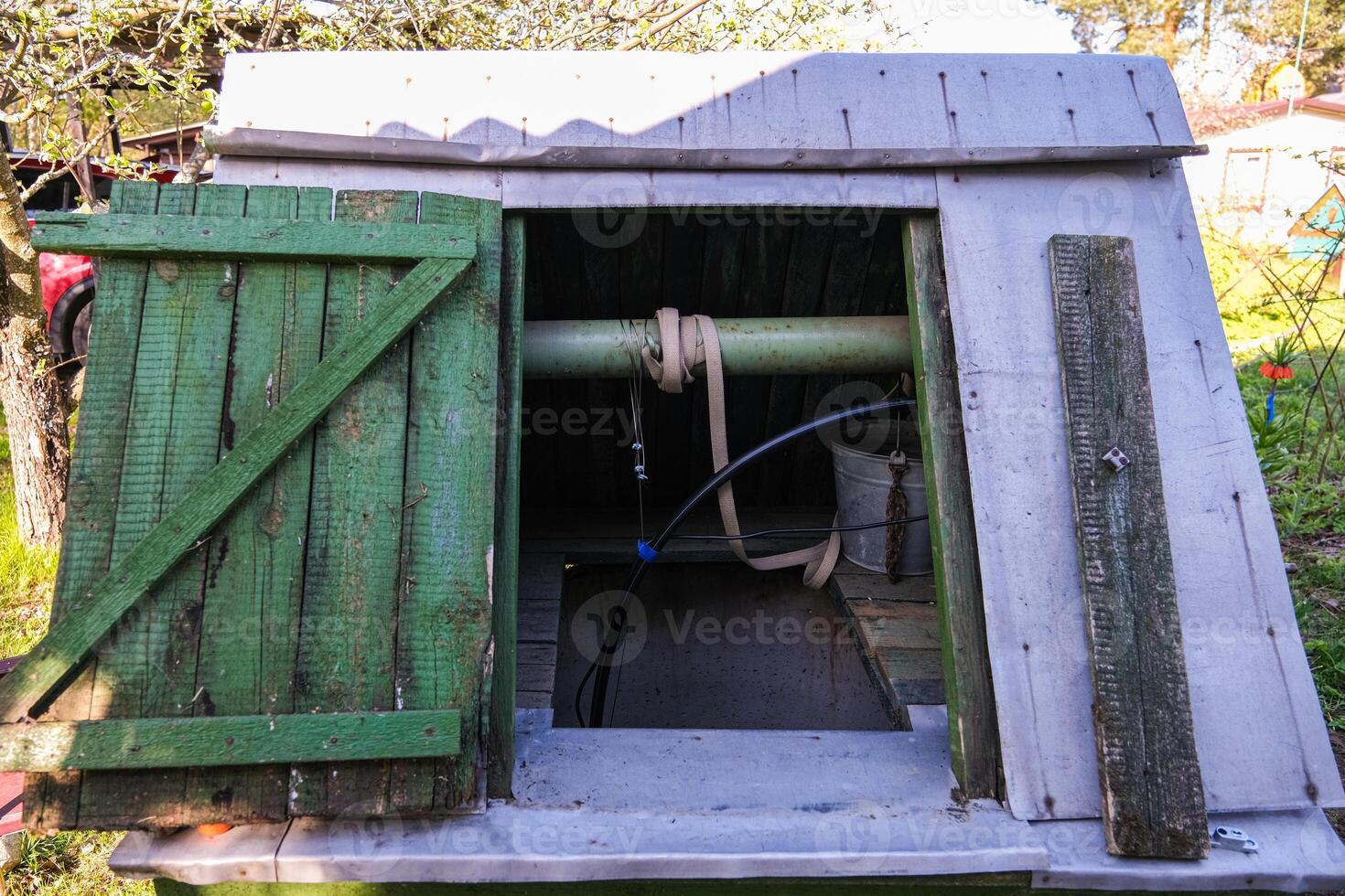 moscow, russia, 10.05.2025 A green shed with a rope tied to the top photo
