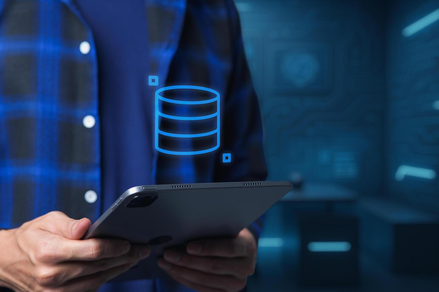 Person Holding Tablet with Data Visualization in Digital Environment photo