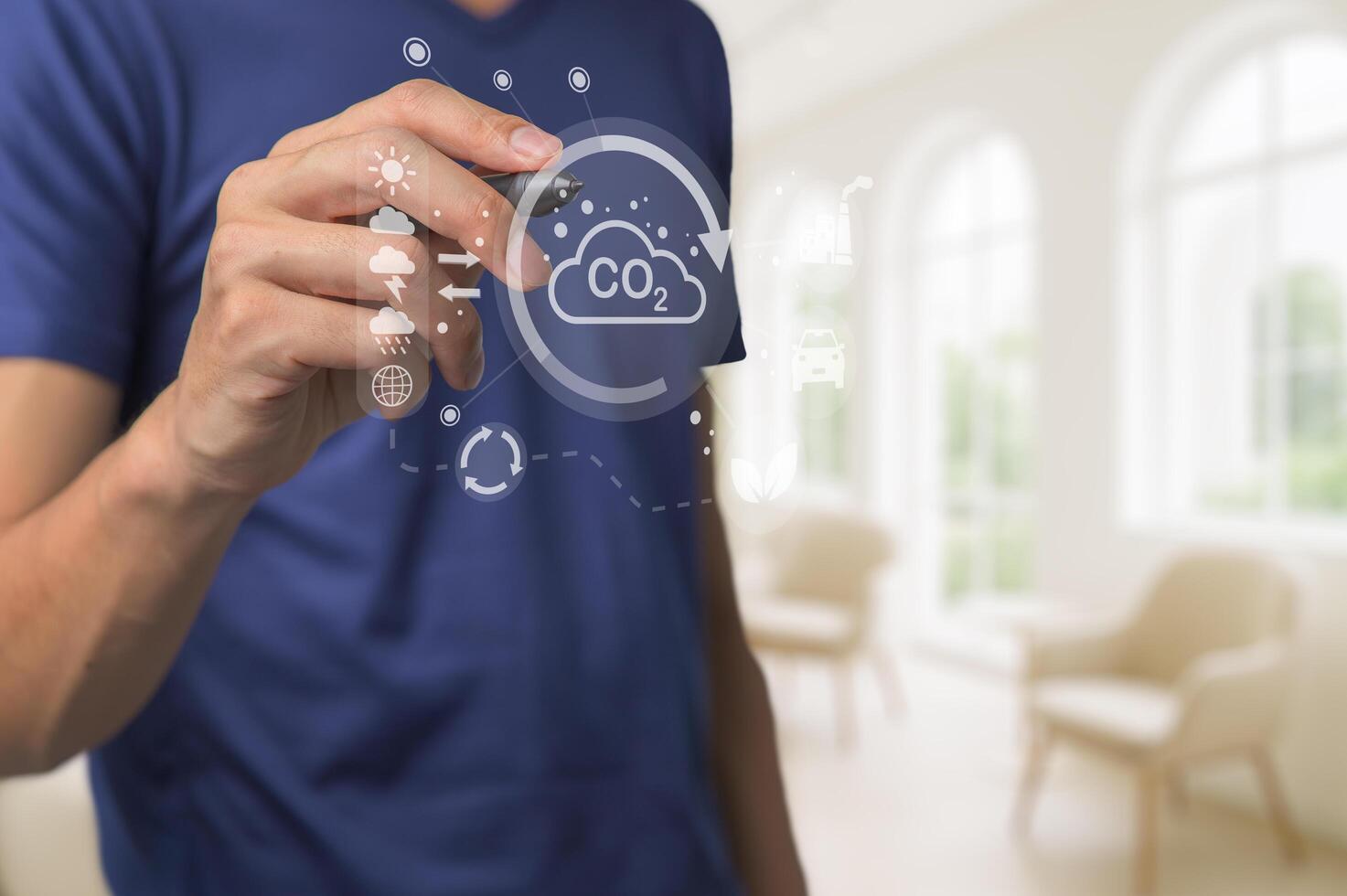 Human Hand Illustrating Carbon Dioxide Concept in Modern Interior photo