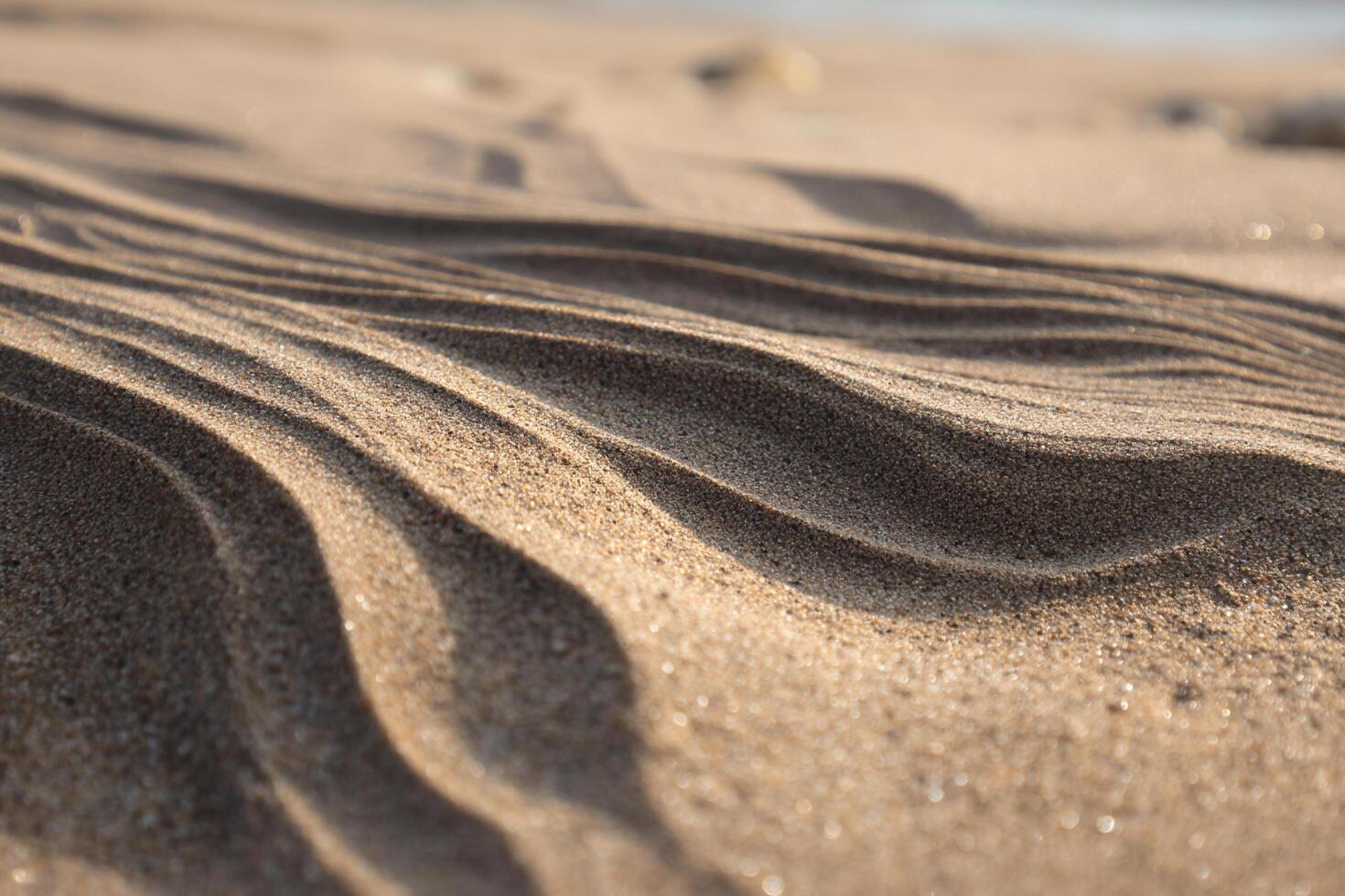 A close up of sand on the beach photo
