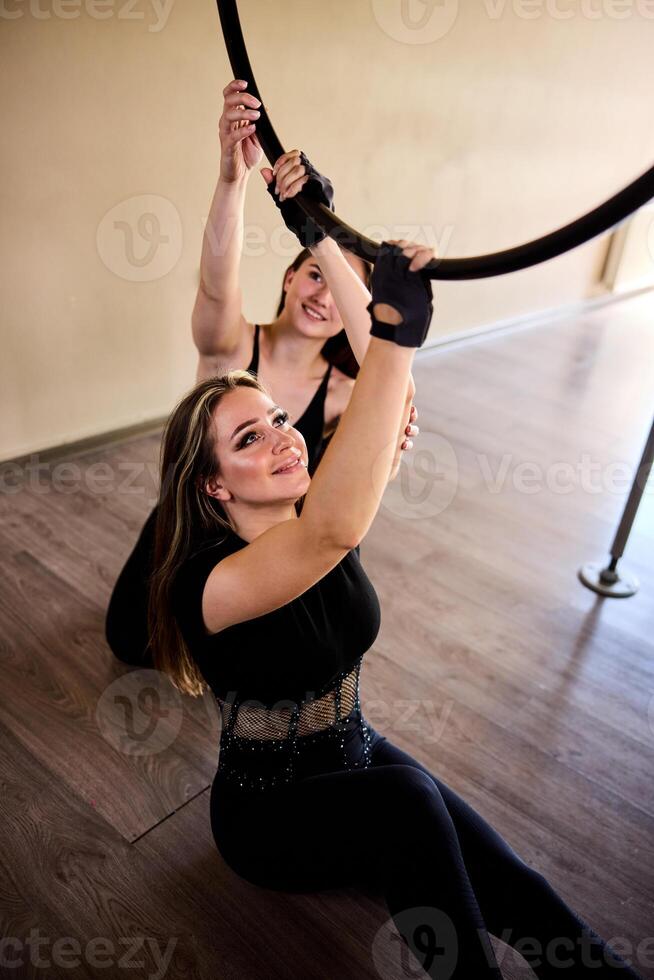 Acrobatics On Aerial Hoop with trainer photo