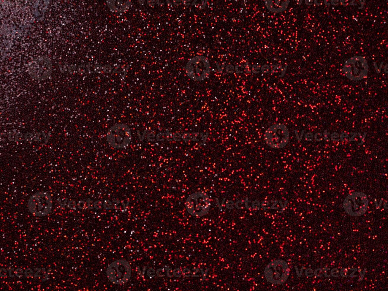 Macro dust of metallic red pigment sparkling photo