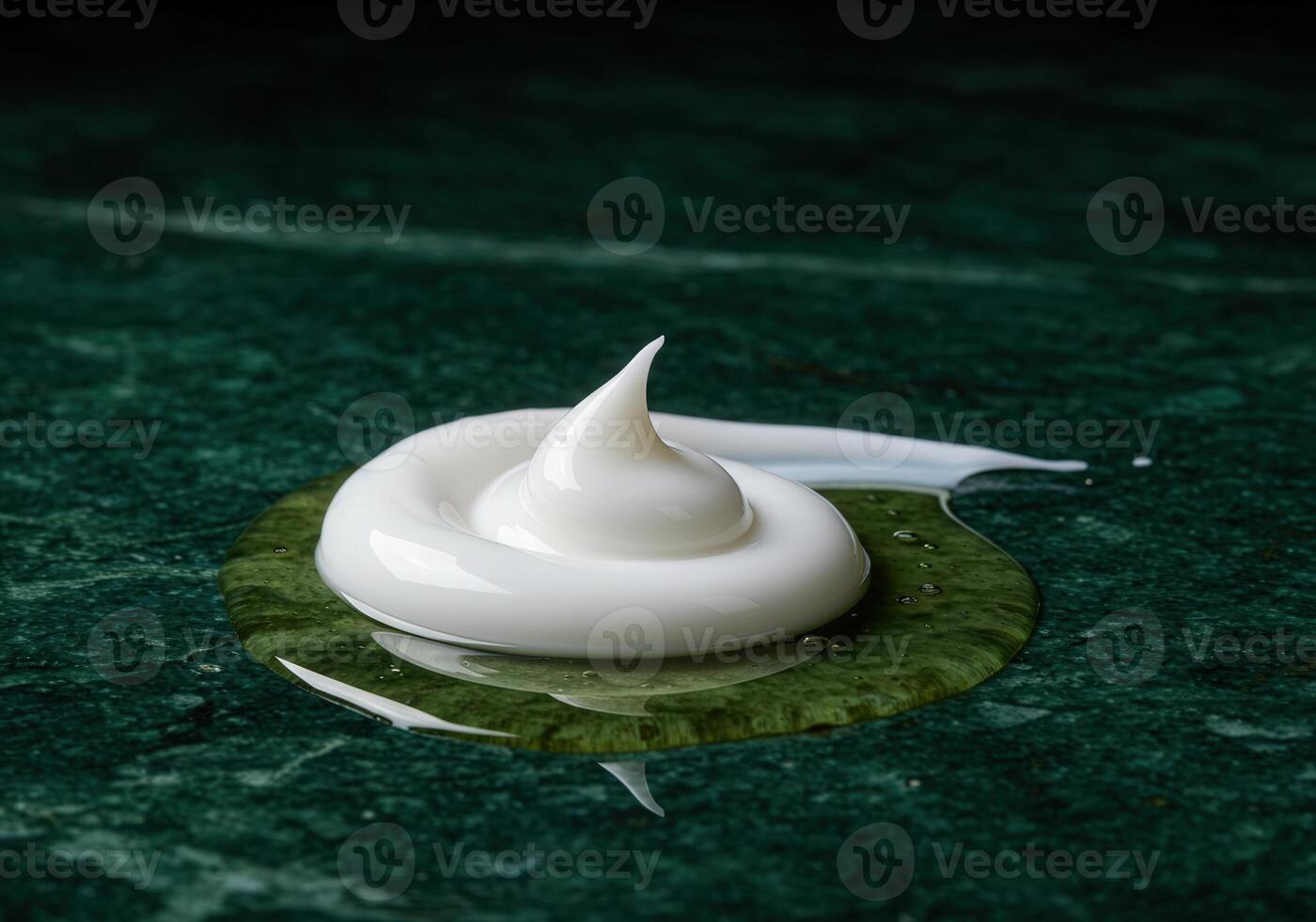 Luxury cream and oil texture on green marble surface showcasing elegance in skincare formulation photo