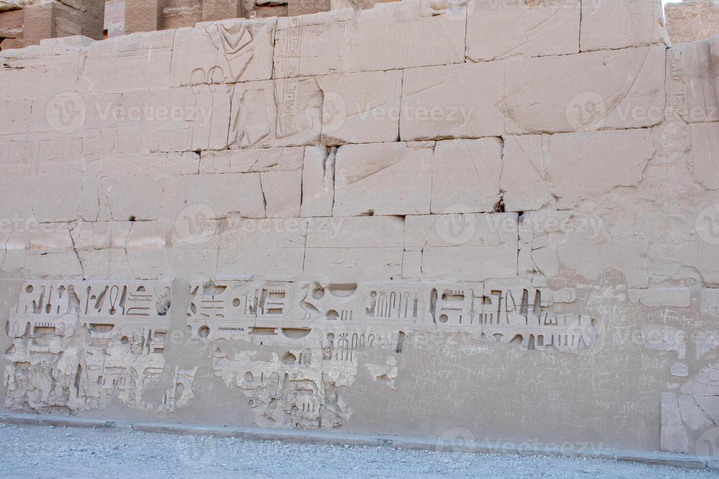 Karnak Temple in Luxor Egypt. Hieroglyphs and Art on pillars and walls. Temples, pylons, chapels, and other buildings in Karnak Temple Complex . photo