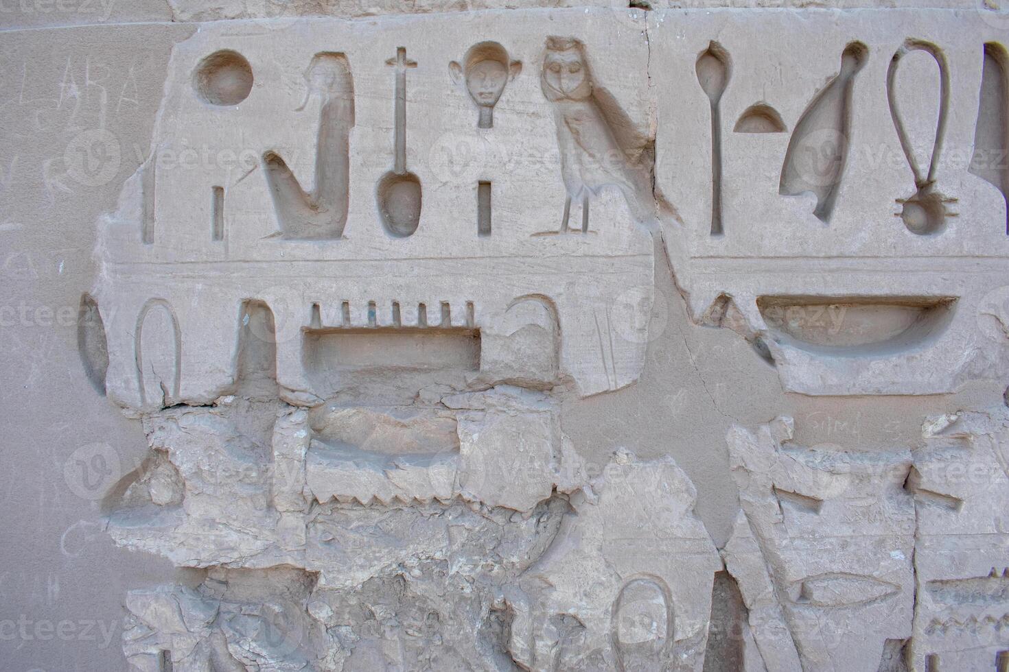 Karnak Temple in Luxor, Egypt. Hieroglyphs and Art on pillars and walls. Temples, pylons, chapels, and other buildings in Karnak, Temple Complex . photo