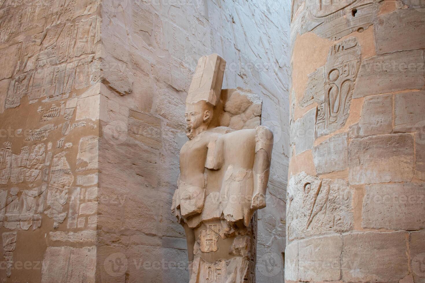 Karnak Temple in Luxor, Egypt. Hieroglyphs and Art on pillars and walls. Temples, pylons, chapels, other buildings in Karnak Temple Complex photo