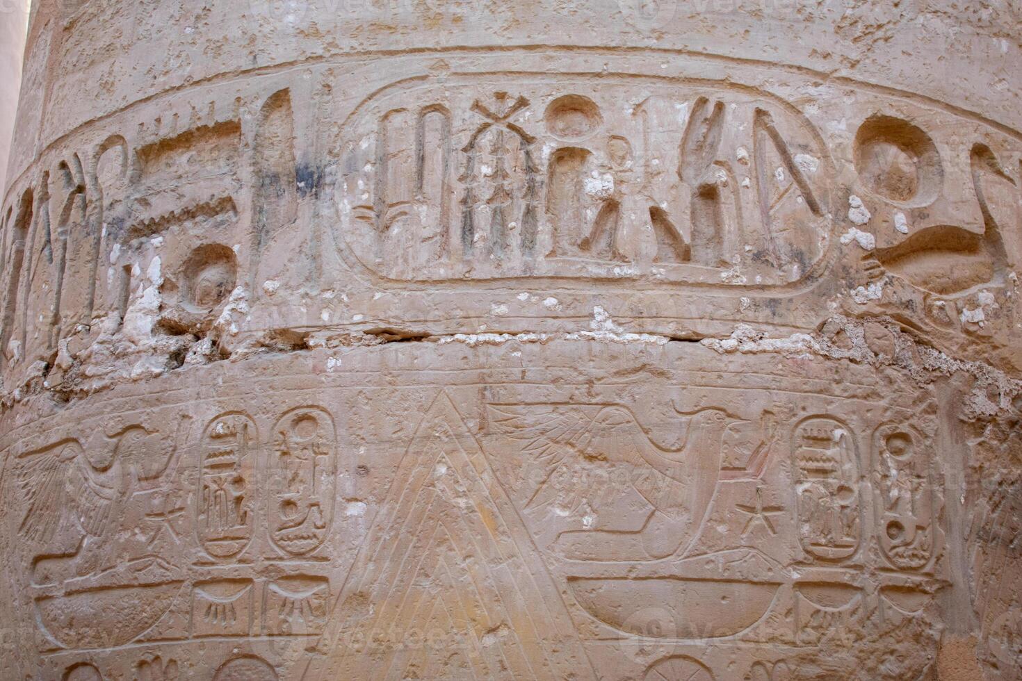 Karnak Temple in Luxor, Egypt. Hieroglyphs and Art on pillars and walls. Temples, pylons, chapels, and other buildings photo
