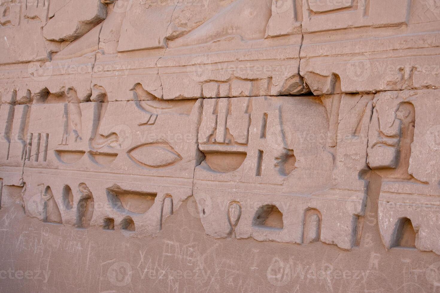 Karnak Temple in Luxor, Egypt. Hieroglyphs and Art on pillars and walls. Temples pylons, chapels, and other buildings in Karnak Temple Complex. photo