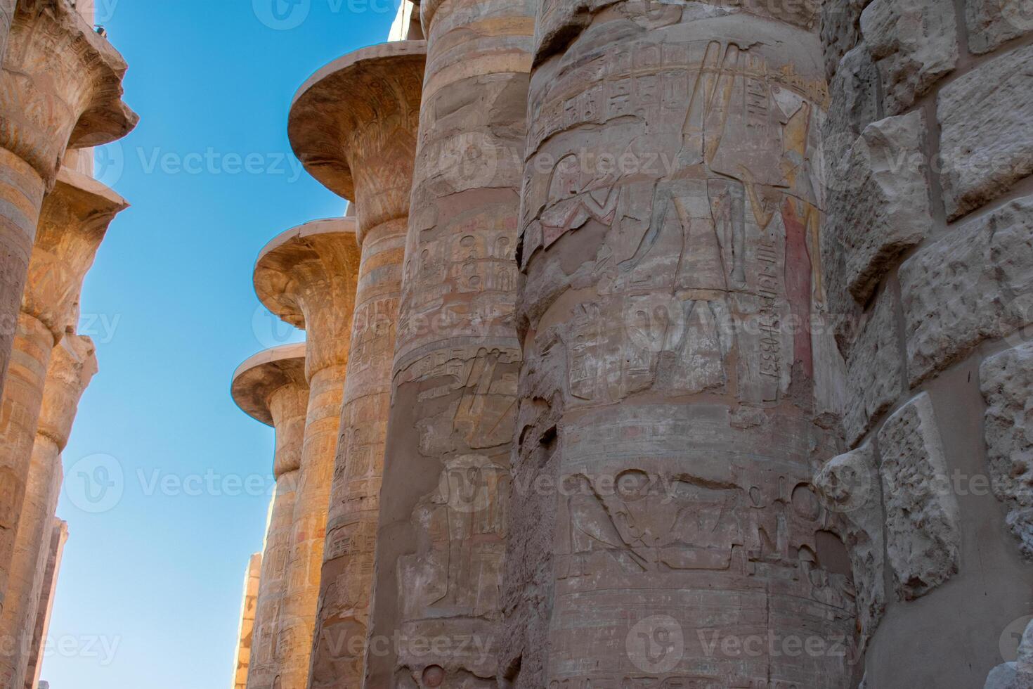 Karnak Temple in Luxor, Egypt. Hieroglyphs and Art on pillars and walls. Temples, pylons, chapels, and other buildings in Karnak Temple Complex . photo