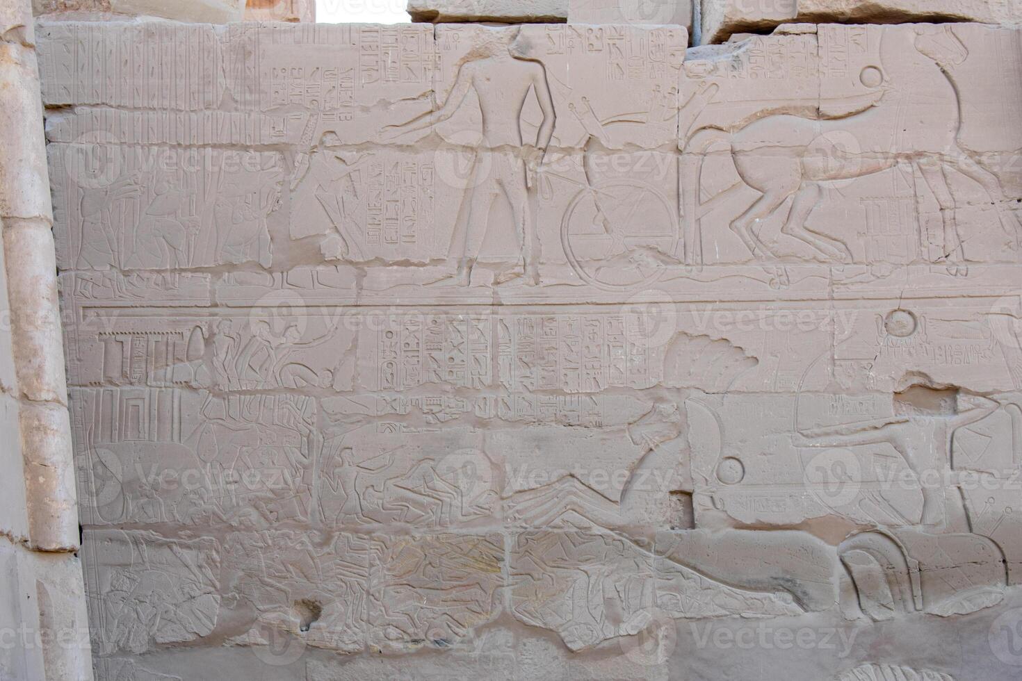 Karnak Temple in Luxor, Egypt. Hieroglyphs and Art on pillars and walls. Temples, chapels, and other buildings in Karnak Temple Complex photo