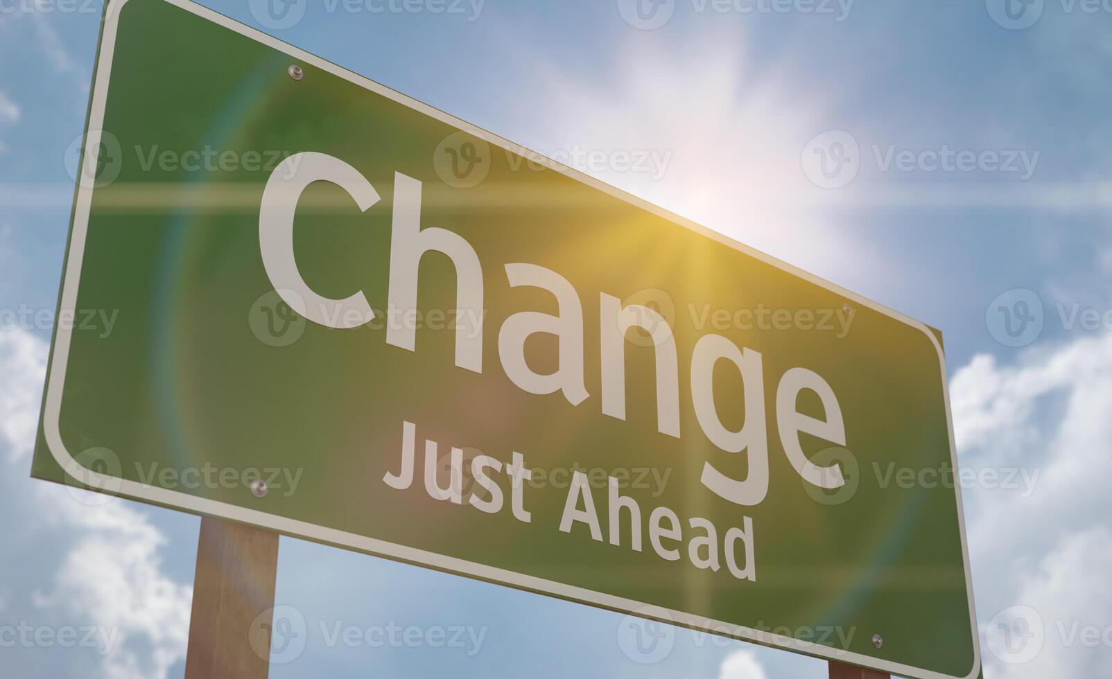 Change Just Ahead Green Road Sign Against a Blue Sky and Clouds. photo