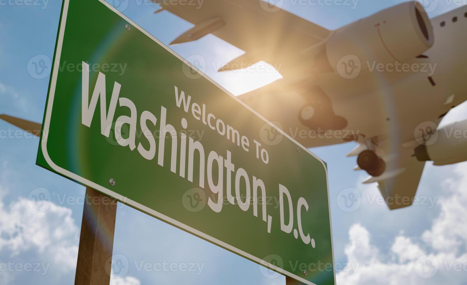 Welcome To Washington D.C. Road Sign Against a Blue Sky and Clouds with Low Flying Airplane Above. photo