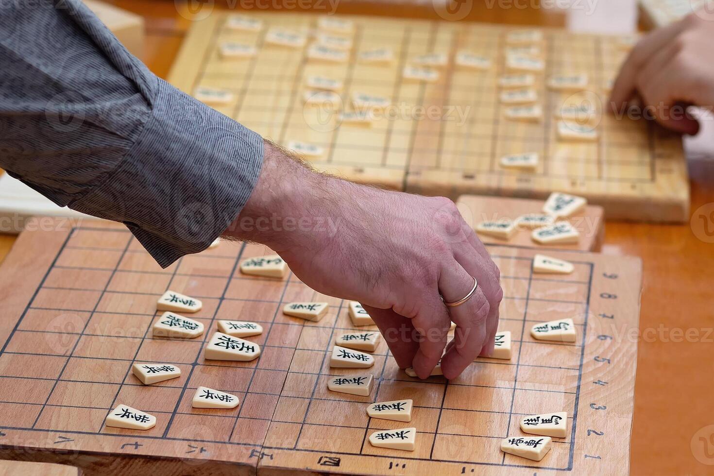 People play Japanese chess shogi photo