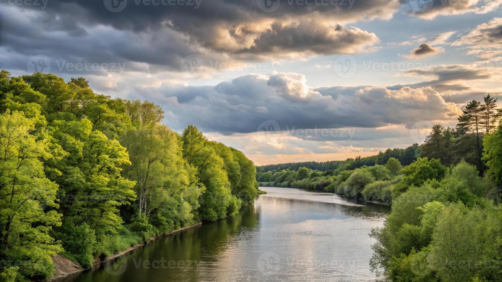 A river surrounded by trees and green grass photo