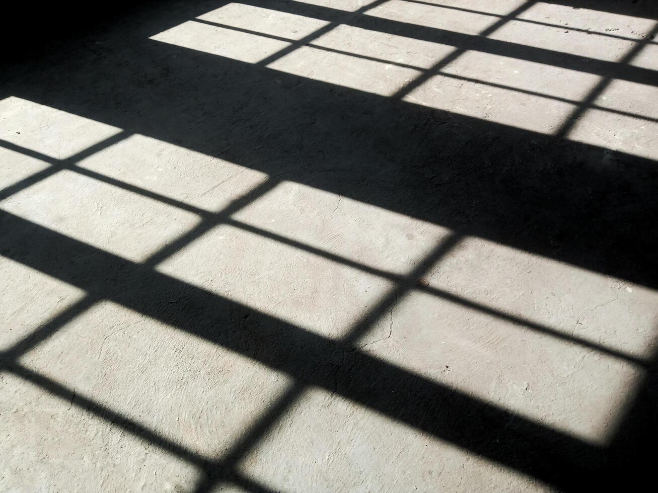 Window shade in a room with dark nuances. photo