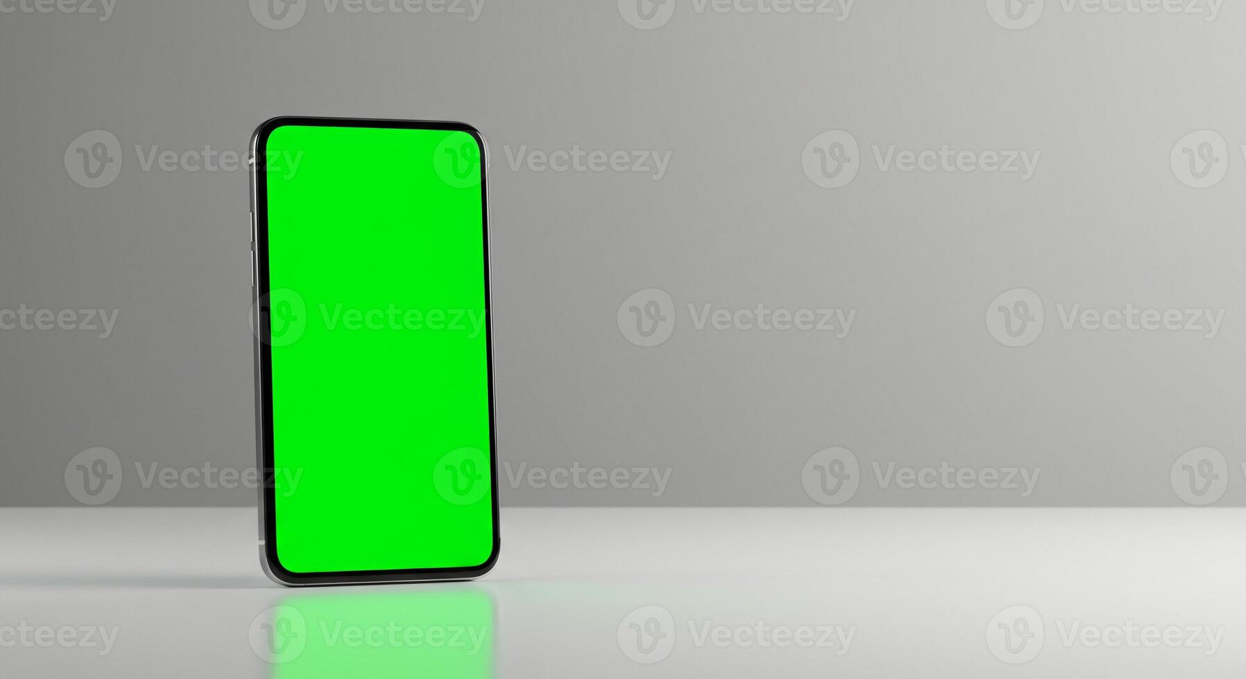 A green screen on a smartphone with a gray background photo