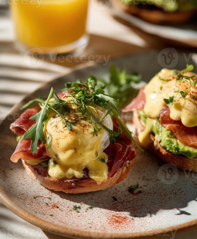 Realistic food photography in film style eggs Benedict on toasted bun with prosciutto, creamy hollandaise sauce, avocado mash and microgreens on top. photo