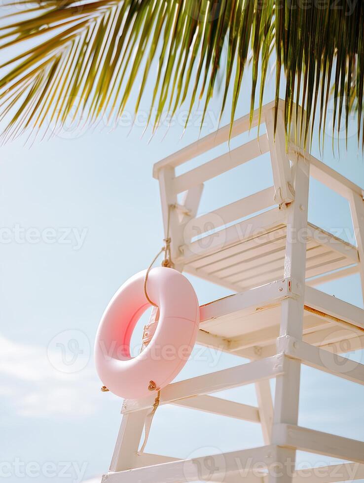 A minimalistic and bright summer scene featuring a white lifeguard chair with a soft pastel rescue float hanging from its frame. photo