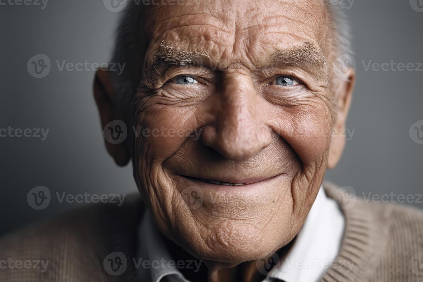 Smiling elderly man with joyful expression in soft lighting photo