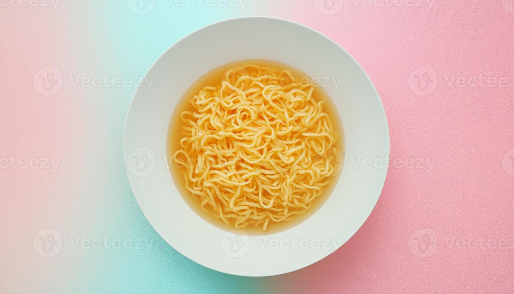 Noodle soup for simple lunch on white plate on pink background photo