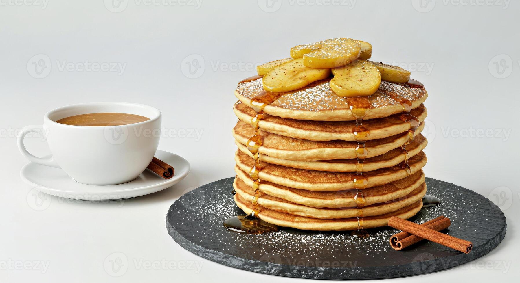 High Stack of Delicious Apple Pancakes Dusted with Cinnamon Sugar on a Slate Plate photo