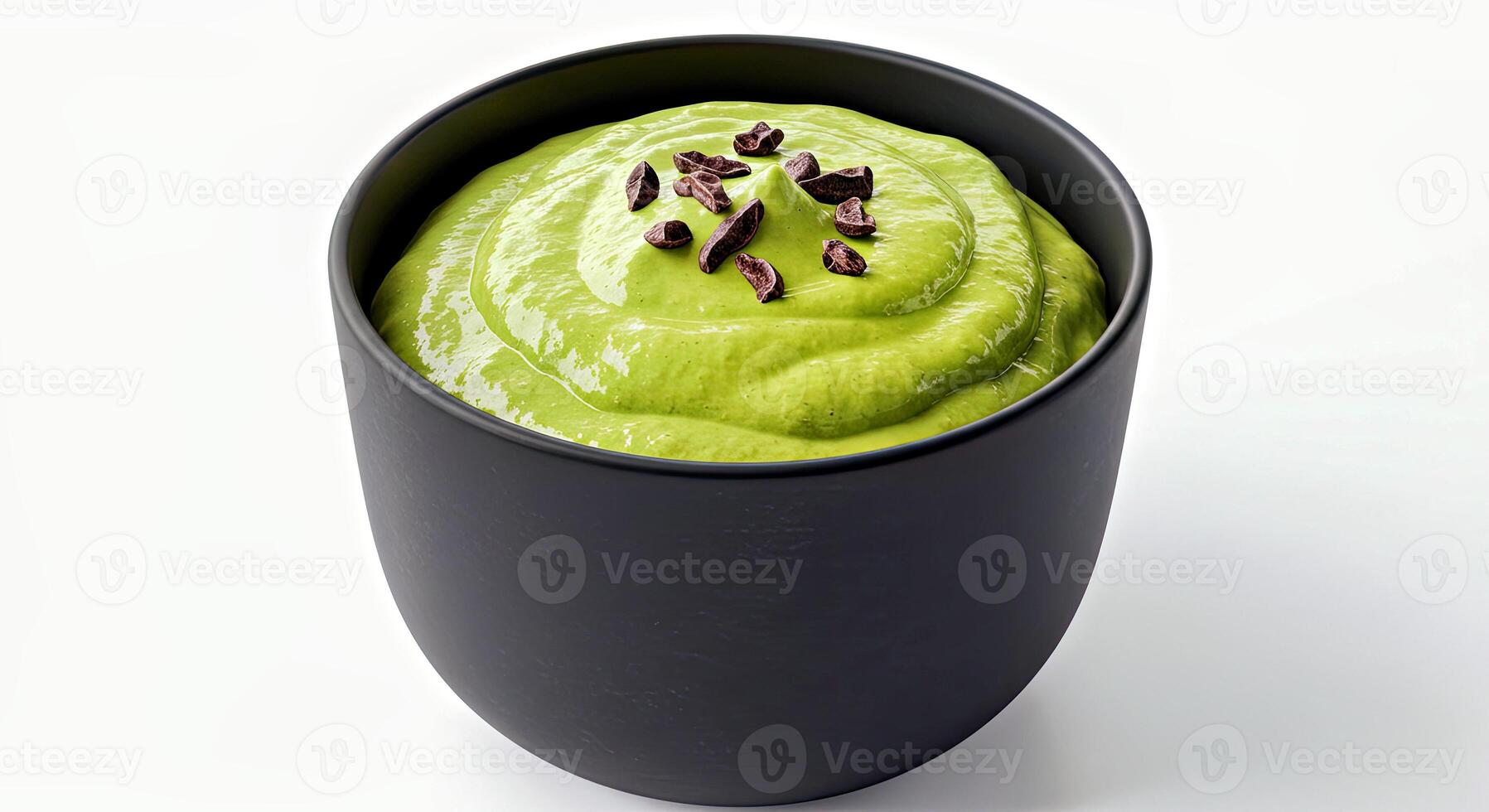 Smooth and Creamy Avocado Chocolate Mousse Dessert Served in a Dark Glass Container photo