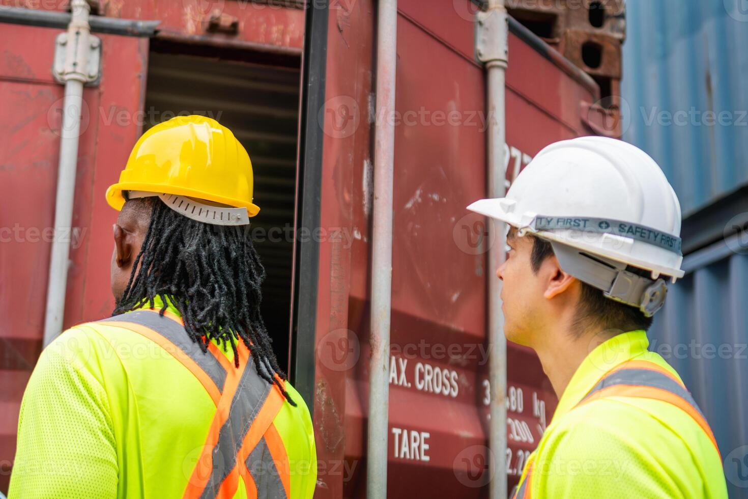 Foreman Dock Worker Team Inspecting Containers Boxes at Industrial Site photo
