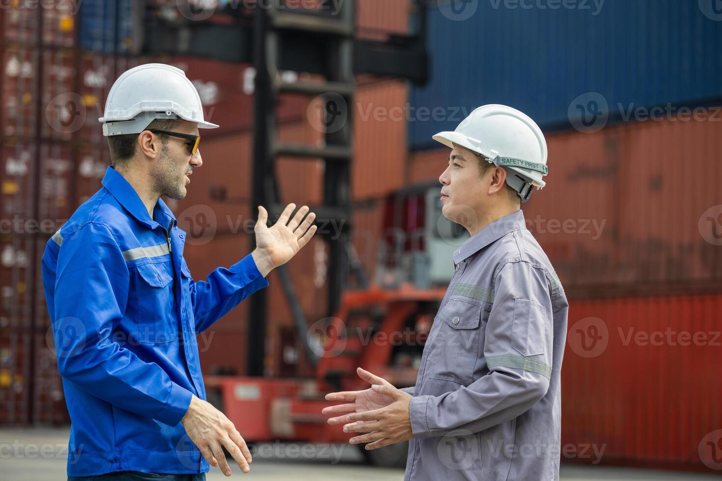 Foreman Dock Worker Team Inspecting Containers Boxes at Industrial Site, Engineer man Team in Safety Gear Control Containers Box at Container Cargo photo