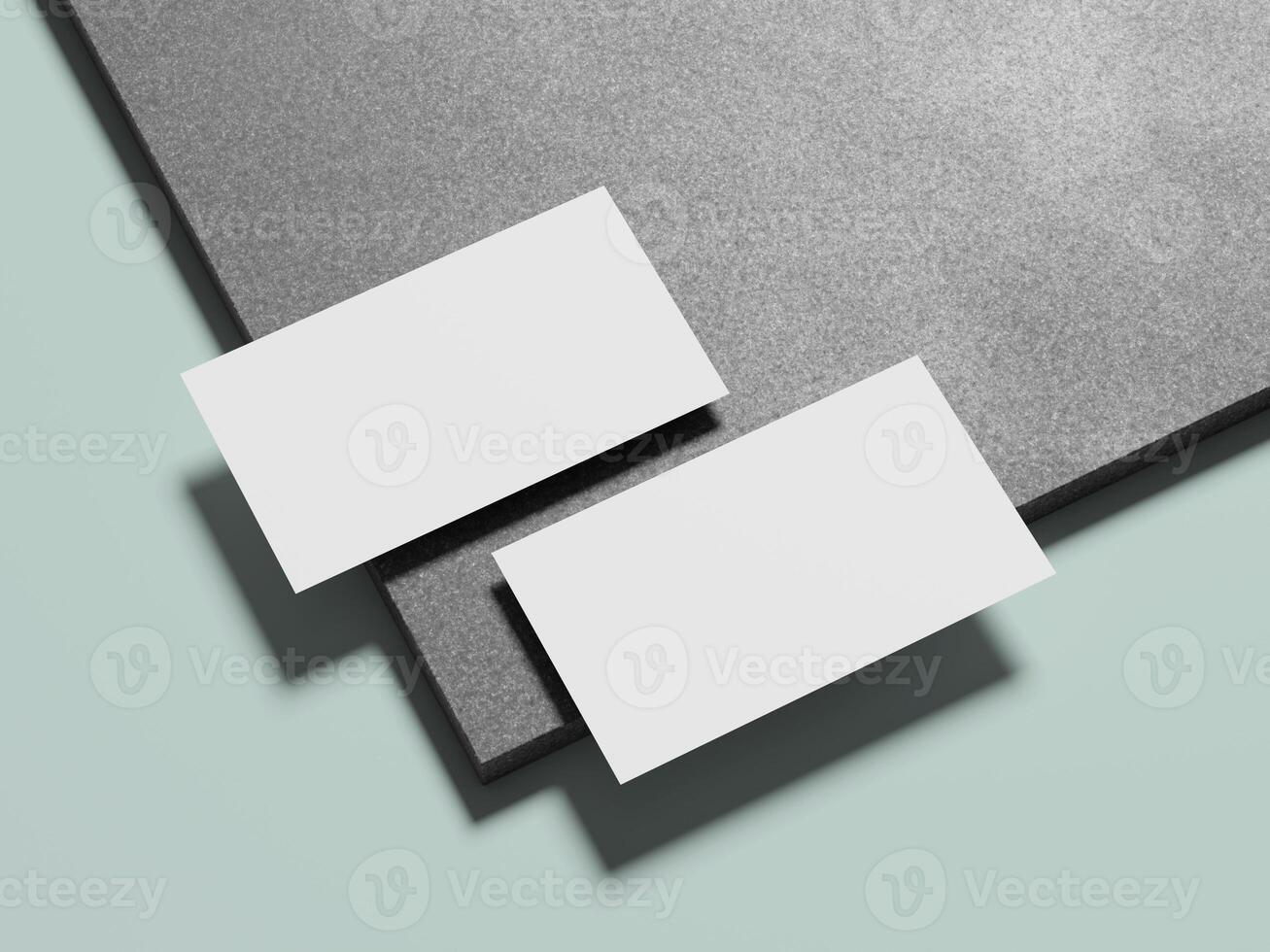 Two white business cards elegantly positioned on a marble surface, offering a stylish and minimalist appearance. photo
