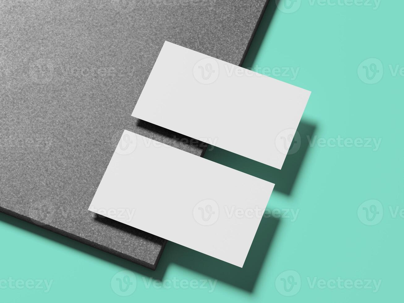 Minimalist white business card resting on a marble surface, creating a professional and clean look. photo